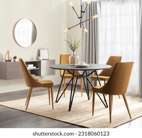 A modern dining area featuring a sleek, rectangular dining table with four orange chairs and a grey patterned rug
