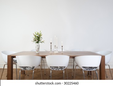 Modern Dining Room With Big White Wall