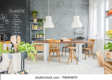 Modern Dining Room With Chalkboard Wall And Fresh Food