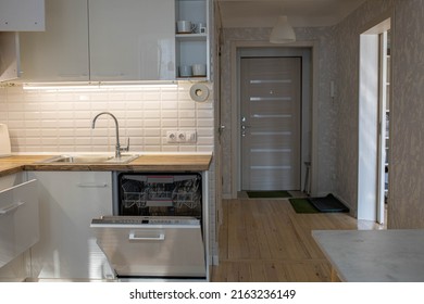 Modern Dishwasher Built-in Wood Worktop.