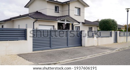 modern door gate of white two storey house driveway entrance gates home access garage in suburb