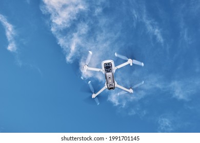 Modern drone with camera in the sky. 