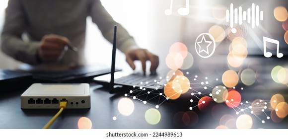 Modern dual band wireless router. Man working in the background. Fast wireless internet concept. - Powered by Shutterstock