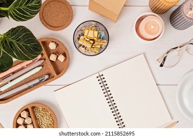 Modern eco friendly desktop with zero waste stationary. Comfortable working space, sustainable life style concept. Top view, flat lay.