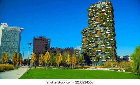 Modern and ecological skyscrapers with autumn trees on the balconies. Bosco Verticale. Modern architecture, vertical gardens, terraces with plants. Green Planet. Blue sky. Milan, Italy, 11.2022 - Powered by Shutterstock