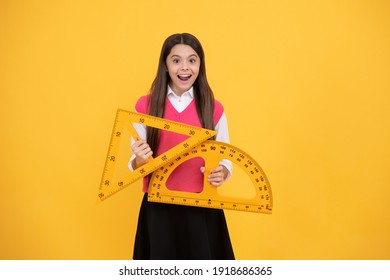 modern education concept. concept of education. measure the angle. child with triangle. amazed teen girl hold protractor ruler. back to school. algebra and geometry. kid study math. stem disciplines. - Shutterstock ID 1918686365
