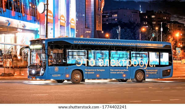 modern electric bus of Moscow city public\
transportation system on street at night with this is electrobus\
lettering in russian on side and mood lighting under bottom in\
Moscow Russia on July\
2020