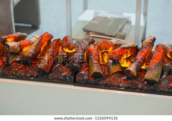 Modern Electric Fireplace Imitation Flame Firewood Stock Photo
