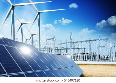 Modern electric grid lines and renewable energy concept with photovoltaic panels and wind turbines