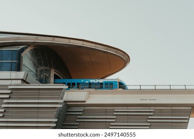 Modern elevated train on a bridge in urban cityscape with public transportation infrastructure