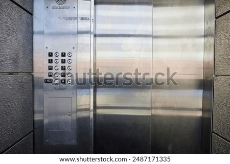 Modern Elevator Door and Panel, Eye-Level View