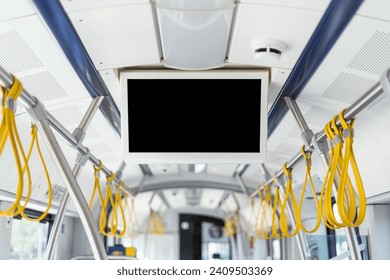 Modern empty tv screen inside bus, train, or tram. Advertising, notification in public transport concept. Showing information for passengers about number and line of route, destination, stops. - Powered by Shutterstock