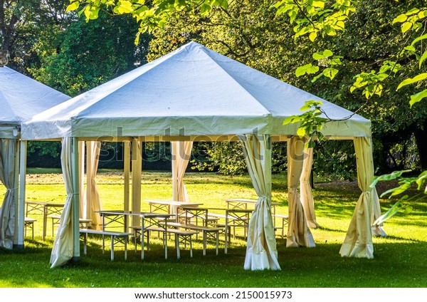 modern entertainment
tent at a park - photo