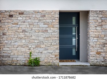 Modern Entry House With Stone Wall