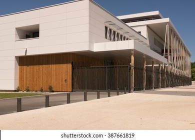 Modern Exterior Of  Industrial Building, With A Wooden Facade