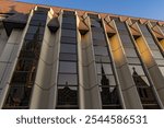 Modern facade of the Hilton Hotel with reflection of the Mathias Church, Budapest, Hungary, Europe