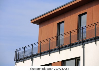 Modern facade with wooden panels