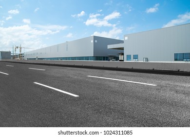 Modern factory buildings and warehouses - Shutterstock ID 1024311085