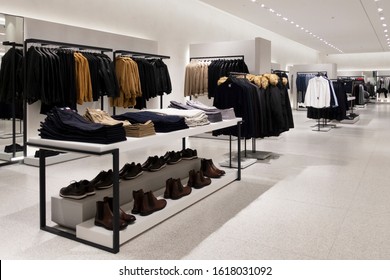 Modern Fashionable Brand Interior Of Men Clothing Shop Store Inside Shopping Center