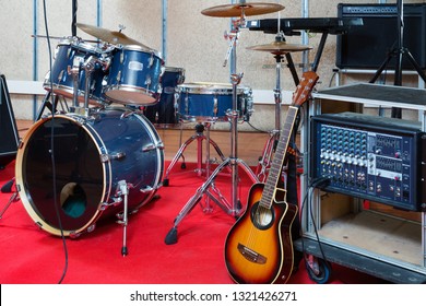 Modern Fashionable Stylish Music Instruments And Equipments For Rock Band In Empty Rehearsal Room