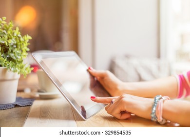 Modern Female Holding Tablet