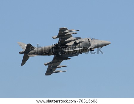 Modern fighter jet performing vertical takeoff