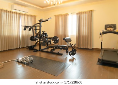 Modern Fitness Center In Home. Private Gym Equipment Decoration. Interior Design Decoration Background.