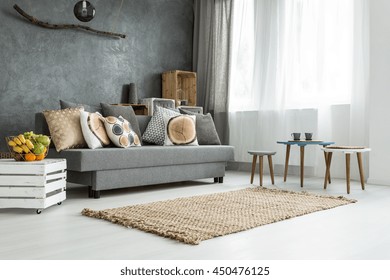 Modern Flat In Grey With Sofa, DIY Furniture, Small Table And Two Chairs