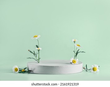 Modern floral product display with podium and chamomile flowers at light turquoise background. Scene stage showcase. Front view with copy space. - Shutterstock ID 2161921319