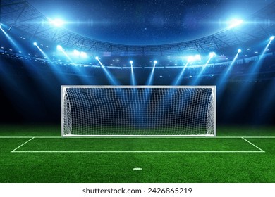 Modern football stadium with a green field with football goals with blue floodlights light at night with stars. Football tournament and football championship. Penalty - Powered by Shutterstock