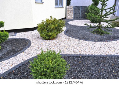 Modern front garden with decorative gravel