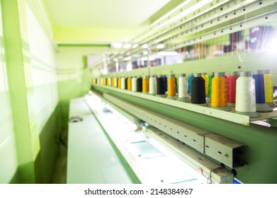 A Modern And Fully Automated High-tech Sewing Factory For Industrial Textile Or Garment Manufacturing Is Closed. Computer Embroidery.