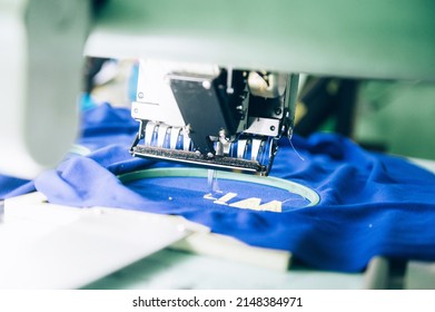 A Modern And Fully Automated High-tech Sewing Factory For Industrial Textile Or Garment Manufacturing Is Closed. Computer Embroidery.