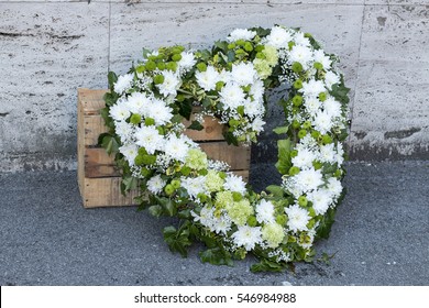 Modern Funeral Wreath Made Of White Chrysanthemums In Flower Market Heart Shaped Funeral Wreath In White And Green Color 