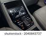 Modern and futuristic car rear seats row air conditioning control system with touchscreen. Monitor with car interior adjustment 