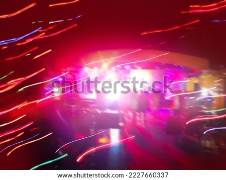 Modern futuristic vibrant night club blurred multicolored background.