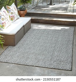 Modern geometric outdoor area botanical rug design. - Shutterstock ID 2150551187