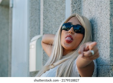 modern girl with rebellious expression in the street - Shutterstock ID 2179518827