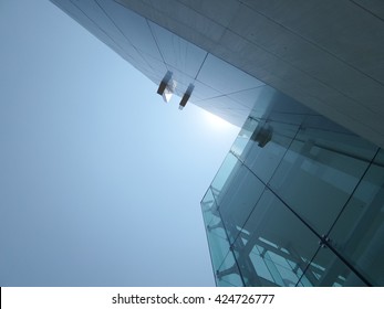 Modern glass building on clear sky