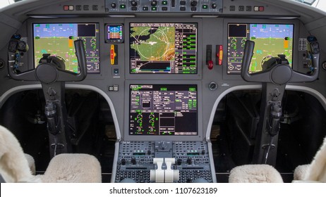 Modern Glass Cockpit In A Business Jet Aircraft.