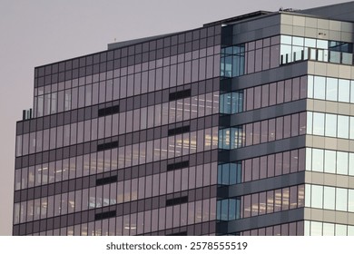 Modern Glass Office Building in Bellevue with Reflections of the Evening Sky