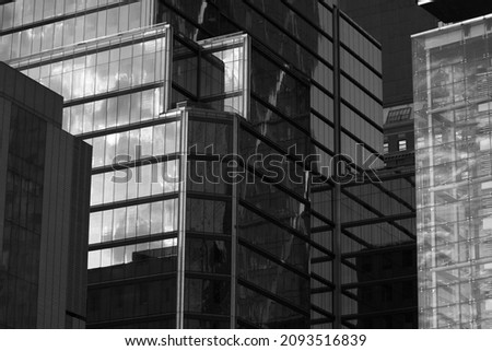 modern glass office buildings. Architecture in the city center in black and white photography. 