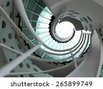 modern glass spiral staircase with metallic hand-rails.