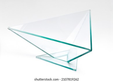 Modern glass vase with triangular shape, isolated - Shutterstock ID 2107819262