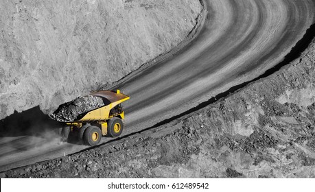 Modern Gold Mine in Kalgoorlie, Western Australia. Large truck transports gold ore from the Super Pit, Open cast mine.