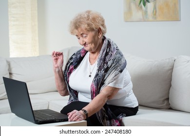 Modern Grandma Talking On The Skype With Grandson