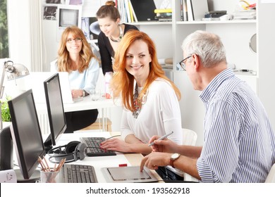 Modern Graphic Designer Woman Working With Colleagues In Office. Small Business.