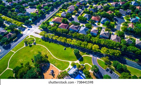 Modern green park Round Rock , Texas , USA Suburb growing outside of Austin high aerial drone view green architecture in new development of Homes vast Neighborhood Suburbia