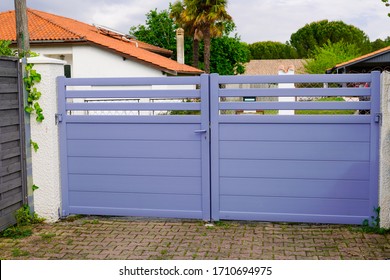modern grey gate aluminum portal with blades suburbs house street