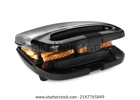 Modern grill maker with sandwiches on white background